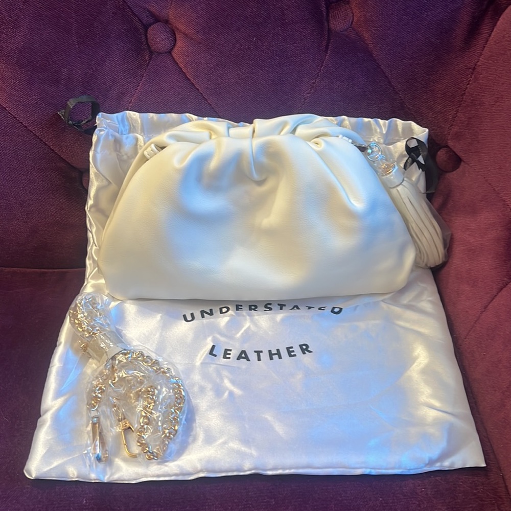 NEW UNDERSTATED LEATHER VANILLA WHITE CLUTCH W/ GOLD PLATED HARDWARE W/ TASSEL